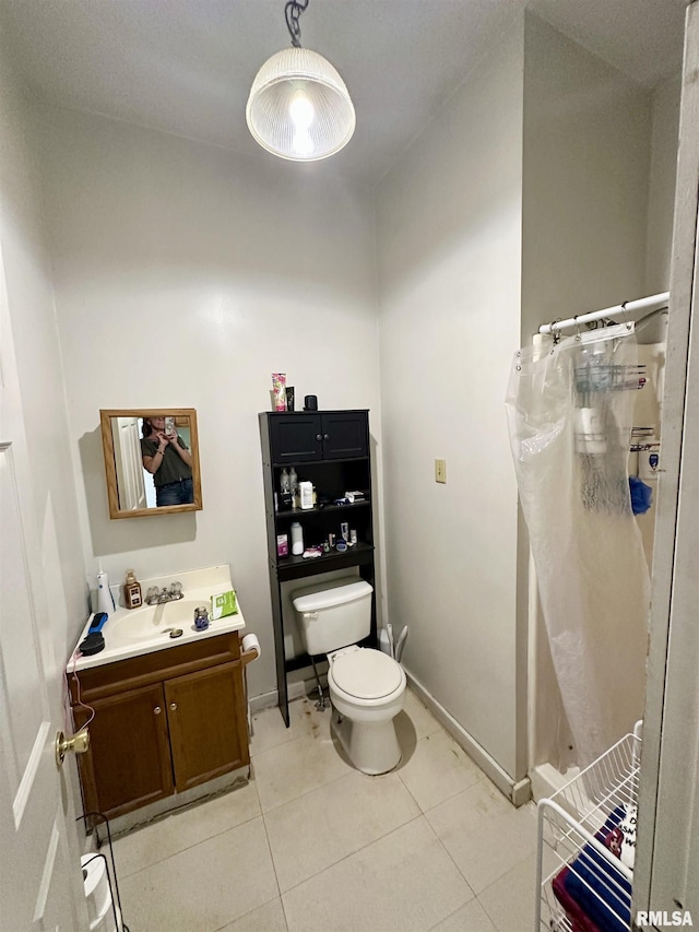 311 Main St, Meredosia, IL 62665 - bathroom featuring vanity, a shower with shower curtain, and tile patterned flooring