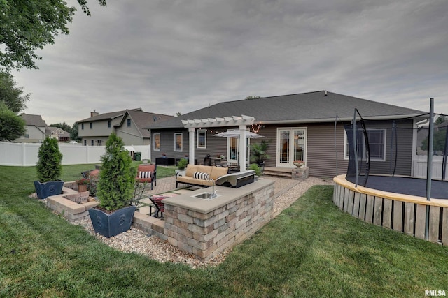 3005 Helens Ct, Quincy, IL 62305 - rear view of house featuring a pergola, a trampoline, outdoor lounge area, and a patio