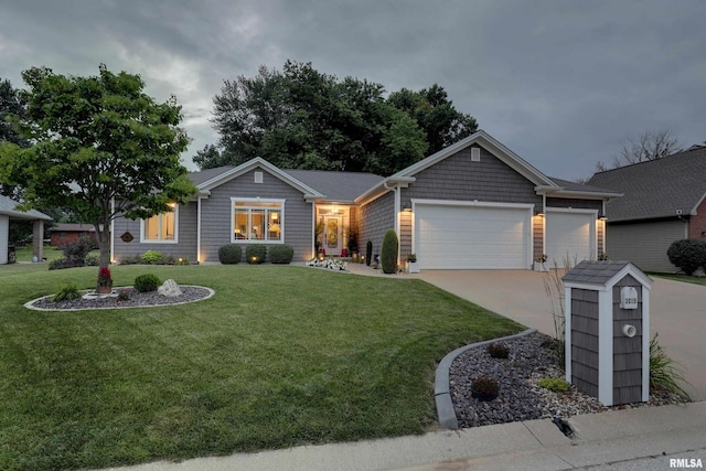 3005 Helens Ct, Quincy, IL 62305 - ranch-style house with an attached garage, a front yard, and driveway