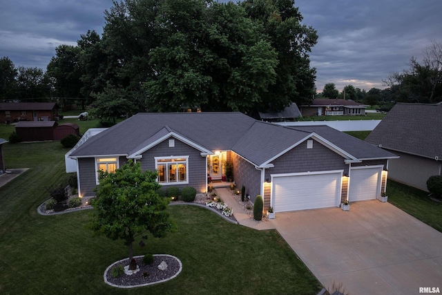 3005 Helens Ct, Quincy, IL 62305 - view of front facade featuring a garage, driveway, and a front lawn