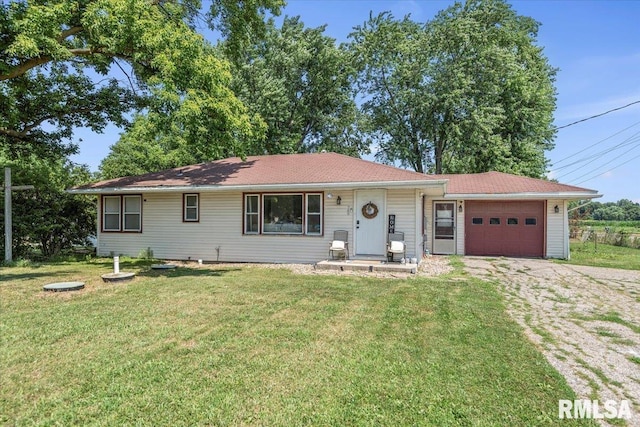 749 E Andrew Rd, Springfield, IL 62707 - ranch-style house with an attached garage, a front lawn, and driveway