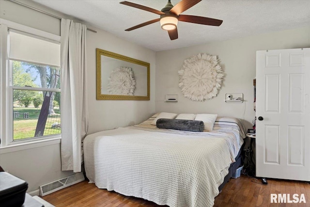 749 E Andrew Rd, Springfield, IL 62707 - bedroom with wood finished floors and ceiling fan