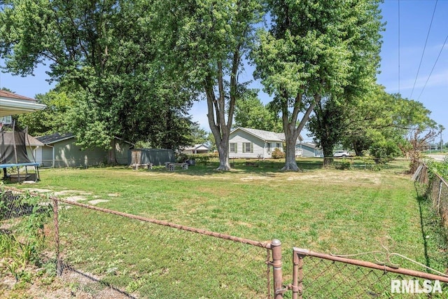 749 E Andrew Rd, Springfield, IL 62707 - view of yard featuring a trampoline