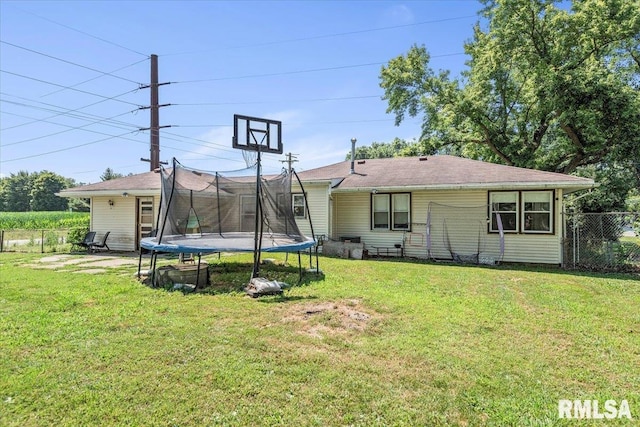 749 E Andrew Rd, Springfield, IL 62707 - rear view of property featuring a trampoline