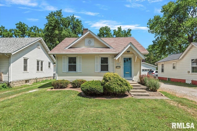 1529 W Reed Ave, Springfield, IL 62704 - view of front of house with a chimney and a front lawn