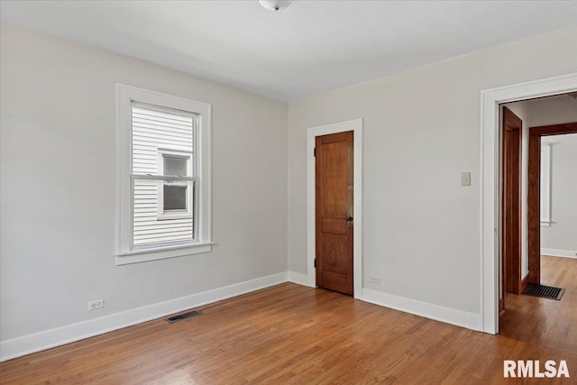 1529 W Reed Ave, Springfield, IL 62704 - spare room with light wood-type flooring and baseboards
