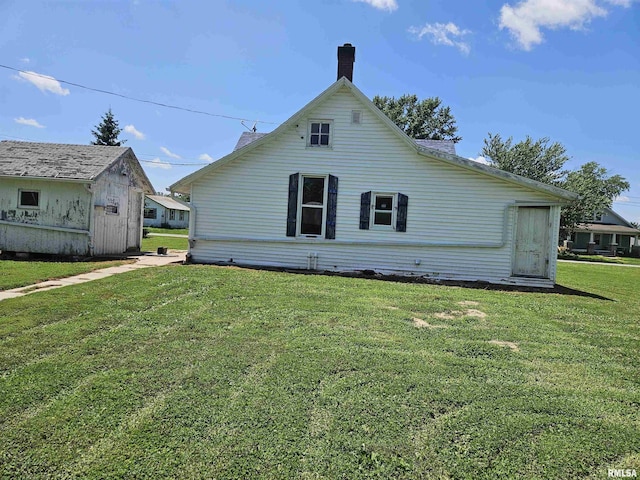 75 N County Road 830 N, Mendon, IL 62351 - rear view of property featuring a yard and a chimney