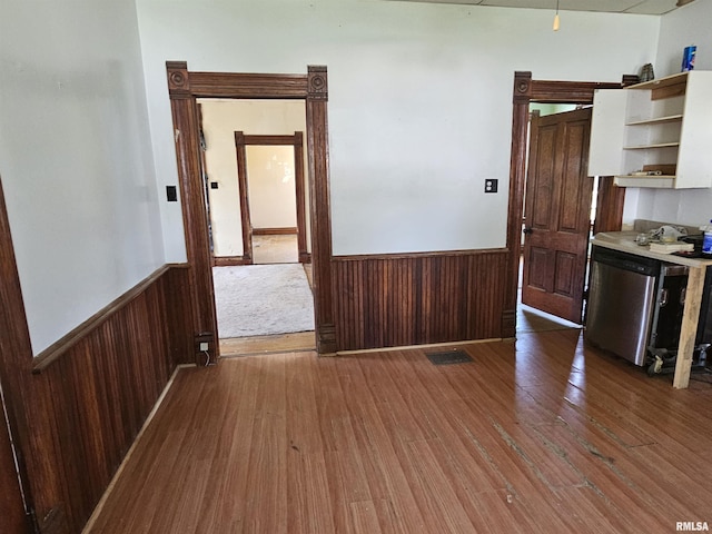 75 N County Road 830 N, Mendon, IL 62351 - unfurnished dining area featuring a wainscoted wall, hardwood / wood-style floors, and wood walls
