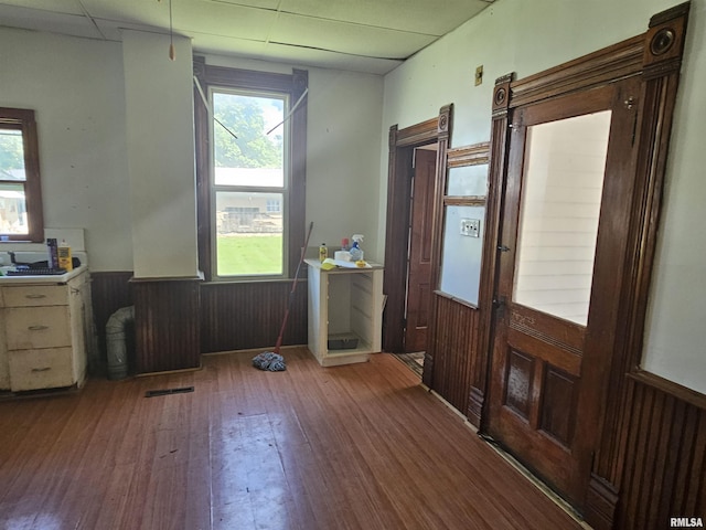 75 N County Road 830 N, Mendon, IL 62351 - entryway featuring wainscoting, wood-type flooring, a drop ceiling, wood walls, and healthy amount of natural light