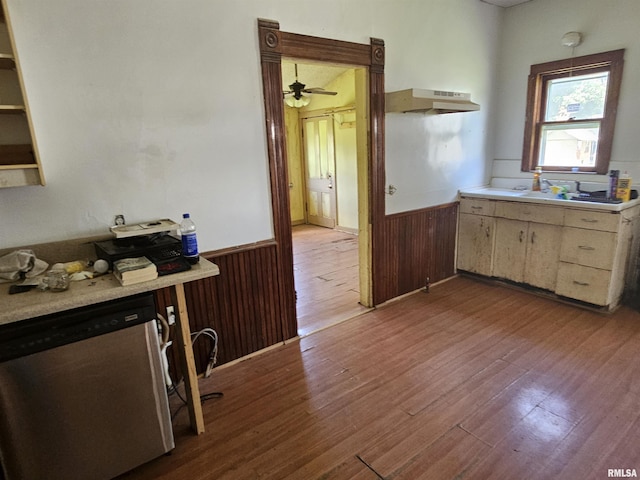 75 N County Road 830 N, Mendon, IL 62351 - kitchen featuring dishwasher, wainscoting, light wood finished floors, light countertops, and wood walls