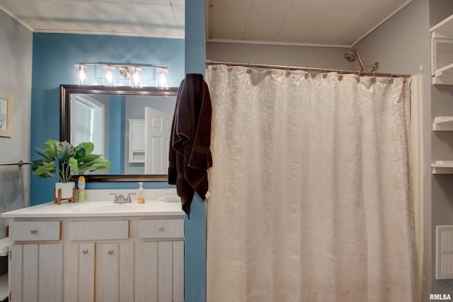 624 Monroe St, Quincy, IL 62301 - bathroom with vanity, ornamental molding, and a shower with shower curtain