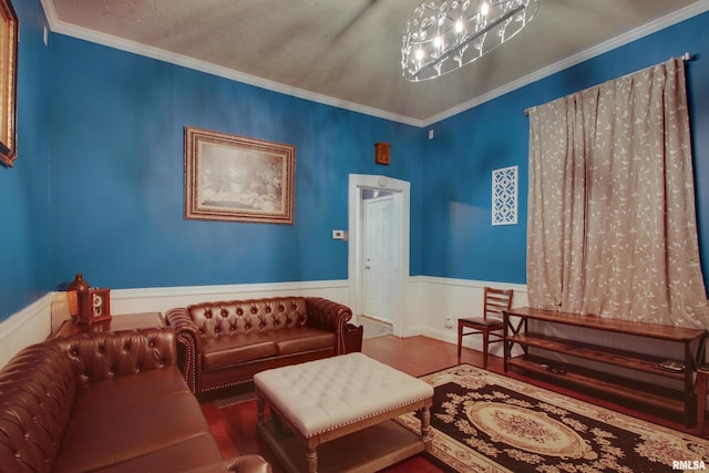 624 Monroe St, Quincy, IL 62301 - living area featuring a wainscoted wall, ornamental molding, and wood finished floors