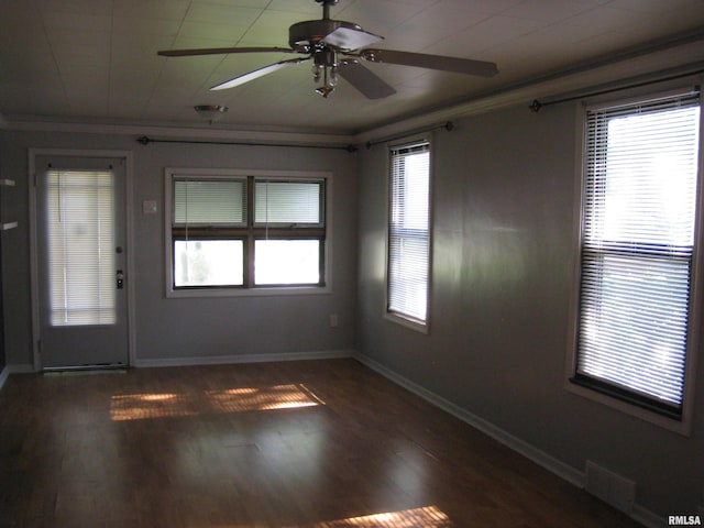 1346 Chestnut St, Quincy, IL 62301 - spare room featuring a ceiling fan, crown molding, and wood finished floors