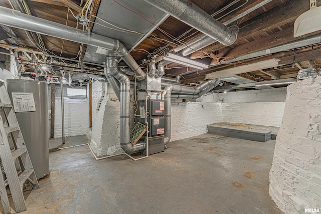 1231 Pulaski St, Lincoln, IL 62656 - unfinished below grade area featuring water heater and heating unit