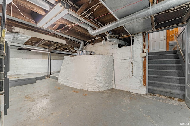 1231 Pulaski St, Lincoln, IL 62656 - unfinished basement with stairway
