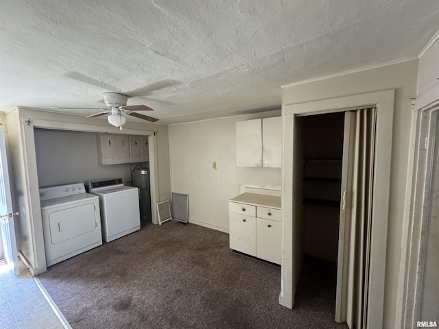 103 S Jackson St, Lincoln, IL 62656 - laundry room with washer and dryer, cabinet space, a ceiling fan, a textured ceiling, and water heater