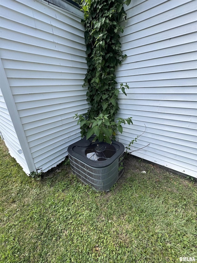 103 S Jackson St, Lincoln, IL 62656 - exterior view of a central air condition unit