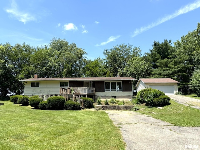 573 Matthews Ct, Oneida, IL 61467 - ranch-style house featuring a front yard, a chimney, an outdoor structure, a garage, and stairway