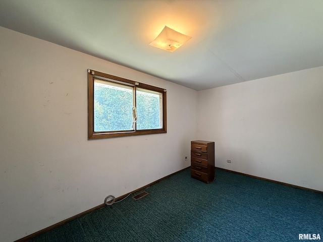 573 Matthews Ct, Oneida, IL 61467 - empty room featuring dark carpet
