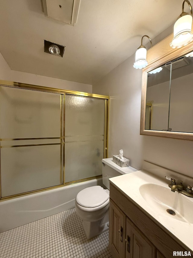 573 Matthews Ct, Oneida, IL 61467 - bathroom featuring vanity, combined bath / shower with glass door, and tile patterned flooring
