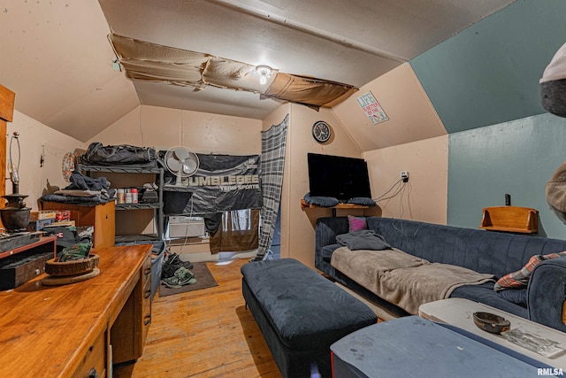 1214 Pekin St, Lincoln, IL 62656 - bedroom featuring light wood-style flooring and vaulted ceiling