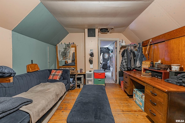 1214 Pekin St, Lincoln, IL 62656 - bedroom featuring light wood finished floors and vaulted ceiling
