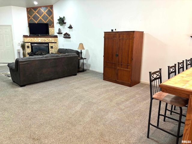 4317 Harvard Dr, Springfield, IL 62712 - carpeted living area featuring baseboards and a fireplace