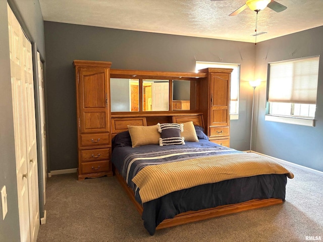 4317 Harvard Dr, Springfield, IL 62712 - carpeted bedroom featuring a textured ceiling and ceiling fan