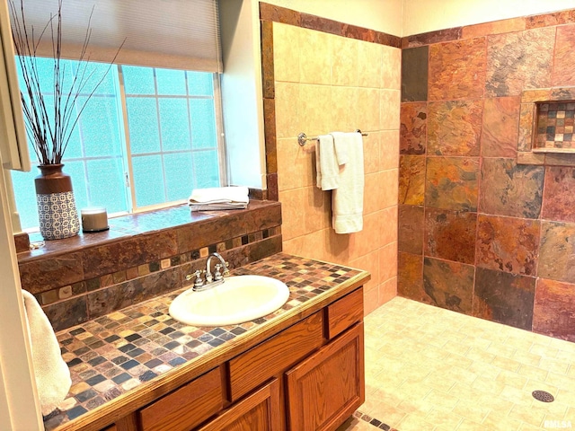 4317 Harvard Dr, Springfield, IL 62712 - full bath featuring vanity, tasteful backsplash, and a tile shower