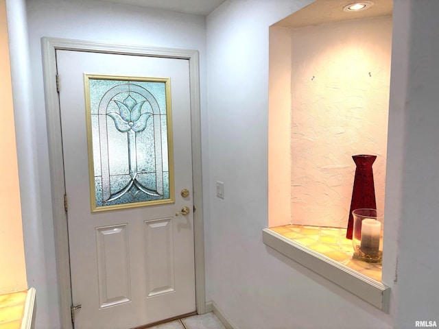 4317 Harvard Dr, Springfield, IL 62712 - entryway with baseboards and light tile patterned flooring