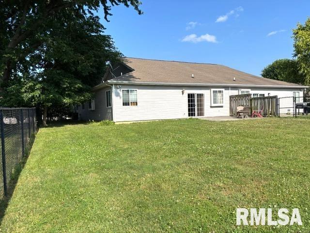 4317 Harvard Dr, Springfield, IL 62712 - rear view of property featuring a fenced backyard and a patio