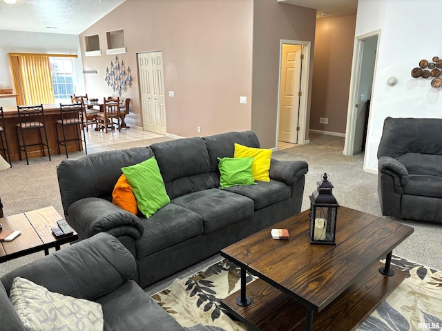4317 Harvard Dr, Springfield, IL 62712 - living room featuring light carpet and vaulted ceiling