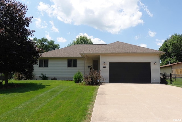 1156 Russell Ave, Galesburg, IL 61401 - ranch-style home with a garage and concrete driveway