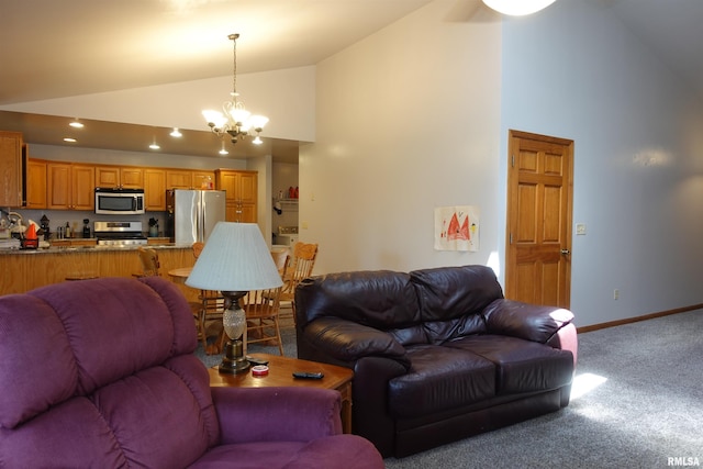 1156 Russell Ave, Galesburg, IL 61401 - carpeted living area with high vaulted ceiling, a chandelier, and recessed lighting