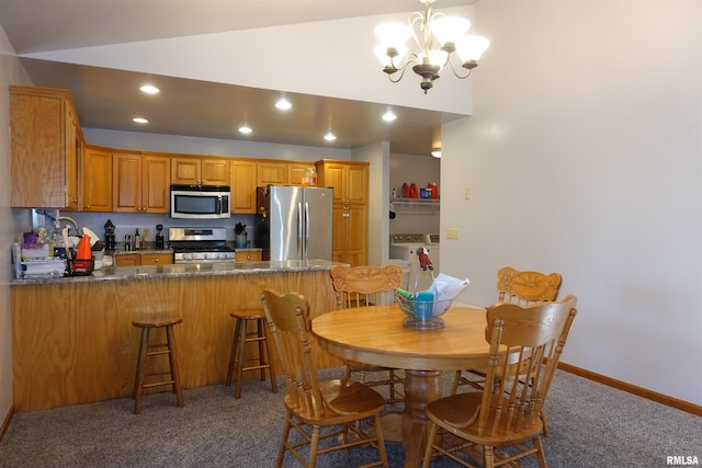 1156 Russell Ave, Galesburg, IL 61401 - dining area featuring separate washer and dryer, light carpet, a chandelier, lofted ceiling, and recessed lighting