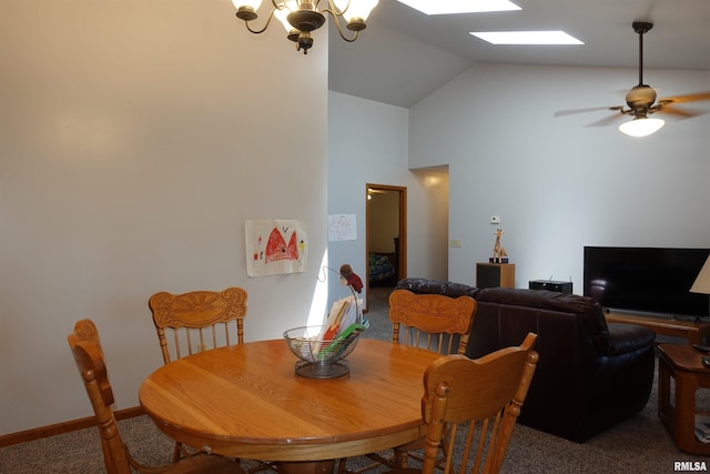 1156 Russell Ave, Galesburg, IL 61401 - carpeted dining room with a skylight, a chandelier, high vaulted ceiling, and ceiling fan
