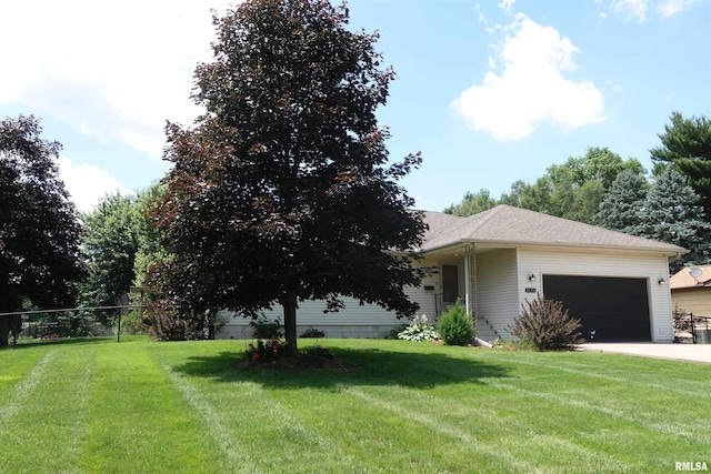 1156 Russell Ave, Galesburg, IL 61401 - view of front facade featuring an attached garage and driveway