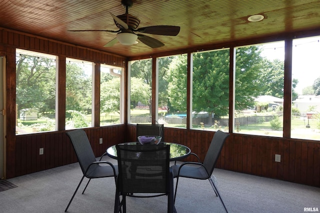 1156 Russell Ave, Galesburg, IL 61401 - sunroom featuring a ceiling fan and outdoor dining area