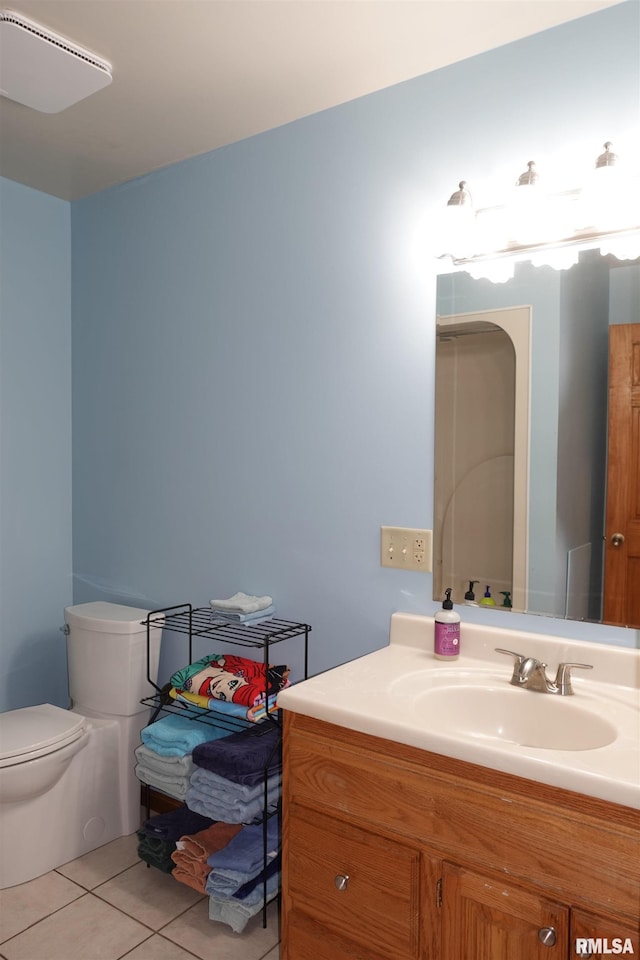 1156 Russell Ave, Galesburg, IL 61401 - bathroom featuring tile patterned floors and vanity