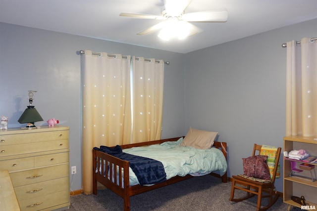 1156 Russell Ave, Galesburg, IL 61401 - carpeted bedroom with ceiling fan and baseboards