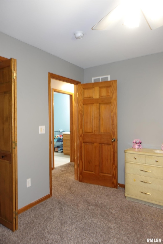 1156 Russell Ave, Galesburg, IL 61401 - carpeted bedroom featuring baseboards