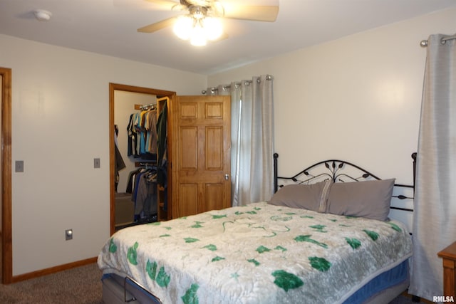 1156 Russell Ave, Galesburg, IL 61401 - bedroom featuring a closet, carpet flooring, a spacious closet, and ceiling fan