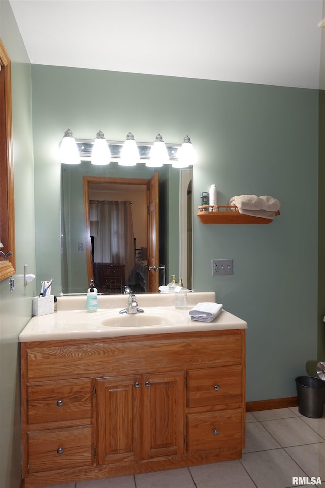 1156 Russell Ave, Galesburg, IL 61401 - bathroom with tile patterned floors and vanity
