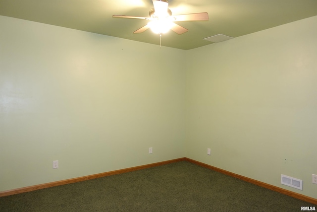 1156 Russell Ave, Galesburg, IL 61401 - carpeted empty room featuring a ceiling fan and baseboards