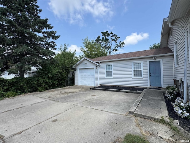 839 E Fremont St, Galesburg, IL 61401 - garage with concrete driveway