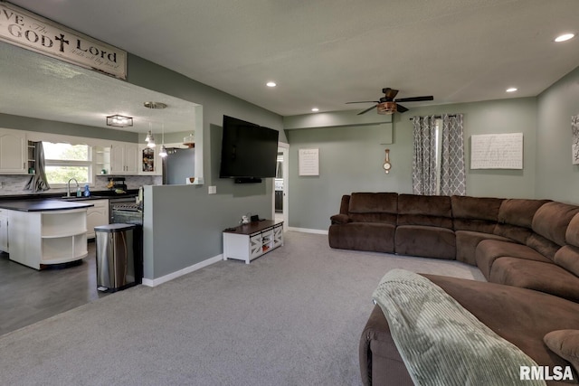 281 N Ave, Plainville, IL 62365 - living area featuring a ceiling fan, recessed lighting, and dark carpet