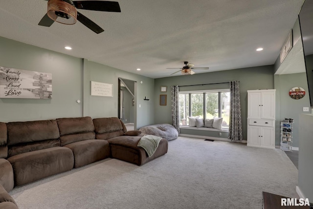 281 N Ave, Plainville, IL 62365 - living area with a ceiling fan, carpet flooring, a textured ceiling, and recessed lighting
