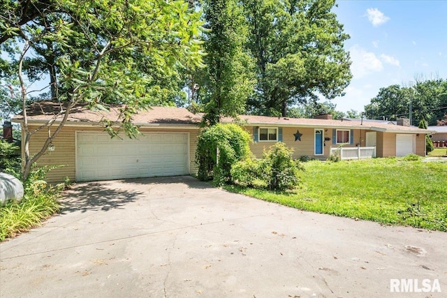 15858 Oak Ln, Girard, IL 62640 - ranch-style house featuring an attached garage, driveway, and a front yard