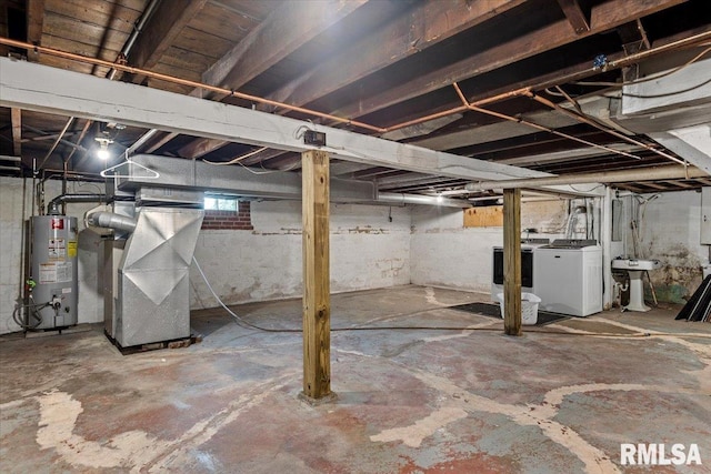 1424 S Lowell Ave, Springfield, IL 62704 - below grade area featuring gas water heater, independent washer and dryer, and heating unit