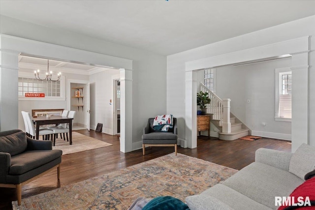 1424 S Lowell Ave, Springfield, IL 62704 - living area featuring a chandelier, wood finished floors, and stairway